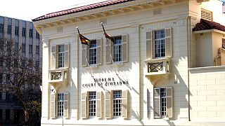 Former Zimbabwean minister dragged to highest court by son for witchcraft